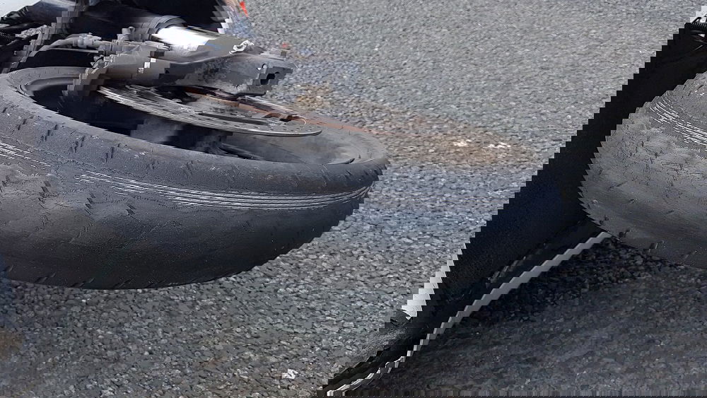 badly worn motorcycle tyre